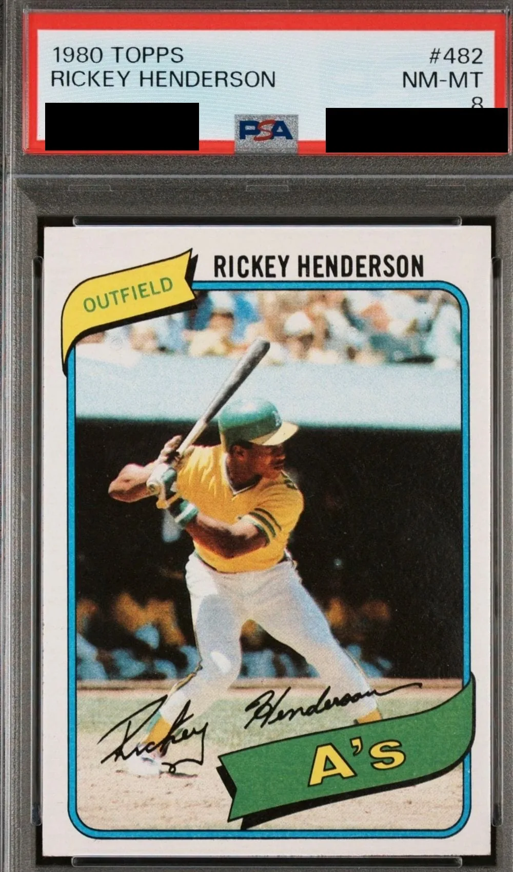 A 1980 Topps Rickey Henderson rookie card in a PSA NM-MT 8 slab